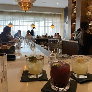 Jalapeño pineapple margarita, blueberry mojitos and classic Margarita