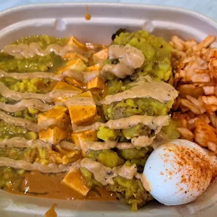 Paneer Tikka Masala Yellow Dal Cabbage Achaar Firm boiled Egg Biryani Sauce Cilantro Mint Chutney Bowl Turmeric Rice