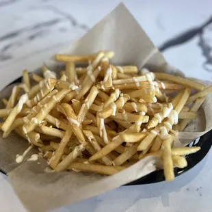 Garlic Fries $9 (Fries Topped with Garlic Confit Oil, Fresh Garlic, Parsley, and Garlic Mayo)