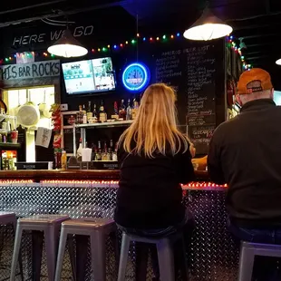 Customers at the bar