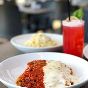 a plate of food and a drink on a table