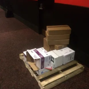 Pallet of supply's in the hallway.
