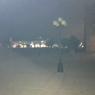 Lights of front entry way that were not on. Management said that they did not have time to put them on