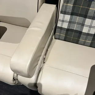 Ripped lounge chair with broken heater