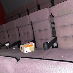 trash in seats in between showings
