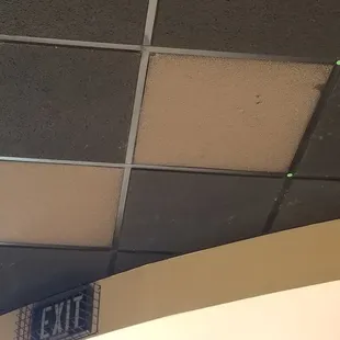 Those white tiles... Those are the return air vents. So full of dust you can't tell they are vents.