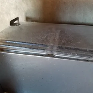 This is the top of their jalapeno station. It was coated in dust, but was full of jalapenos. How do you not notice this!!
