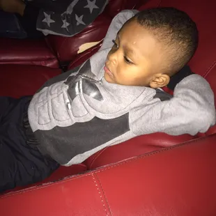 Baby boy enjoying the reclining seats