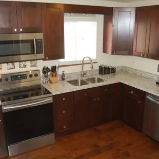 Flooring, Cabinets, Countertops, Sink and Faucet! All Installed and provided by AMC!