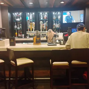 They have draft beers and mixed cocktails here at the bar.