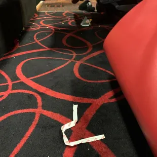 trash, and popcorn on floor