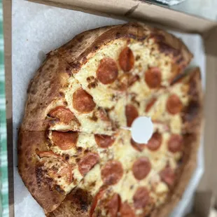 White knight large added pepperoni, no site of fresh garlic, oregano, very few piece of tomato