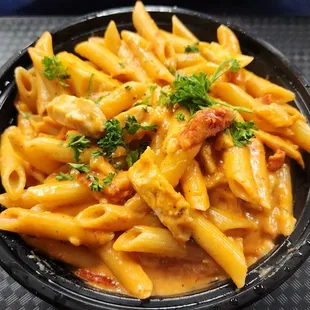 Ameci's House Special pasta sub pink sauce. Penne noodles with peices of chicken, artichokes, and sun dried tomatoes. Amazing!