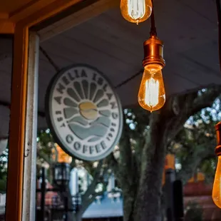 three light bulbs hanging from the ceiling