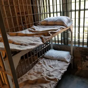 Jail cell bunk beds.