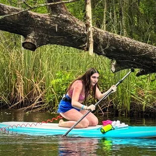 Paddle boarding on calm waters