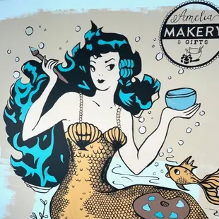 Mural of vintage mermaid inside Amelia Makery