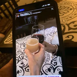 Glass of Cabernet and Beauty school drop out cocktail