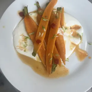 Yuzu goat cheese roasted carrots + hot honey.  Evening menu