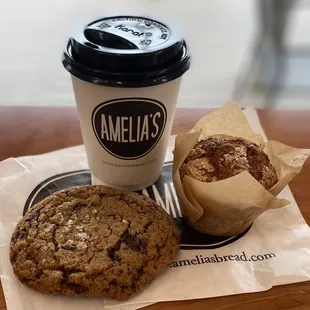 Chai tea with whole milk, chocolate chip cookie, and a white chocolate raspberry muffin
