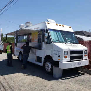 a food truck parked in a parking lot