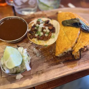 Quesobirria tacos. Al Pastor taco