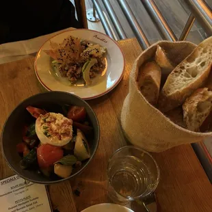Fresh tomato and mozzarella salad and tuna tartare