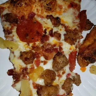 Thursday special.. 5 topping large pizza less than $11... extra cheese, pineapple, pepperoni,  sausage and bacon.