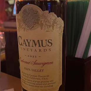 a bottle of wine on a table