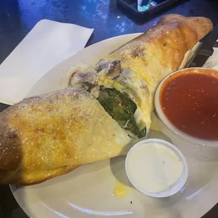 an omelet with a side of sauces