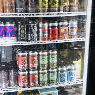 a refrigerator full of cans of beer