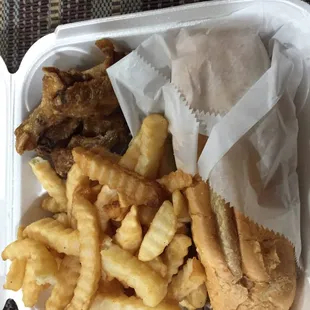 Philly mean with deep fried wings and fries.