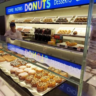 a display of donuts in a bakery