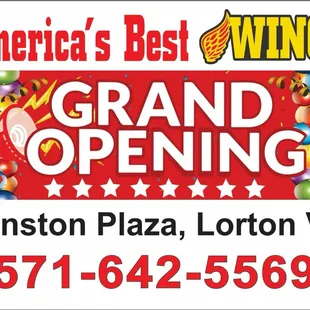 the grand opening sign