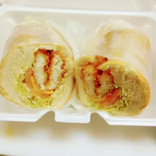 a sandwich in a styrofoam container