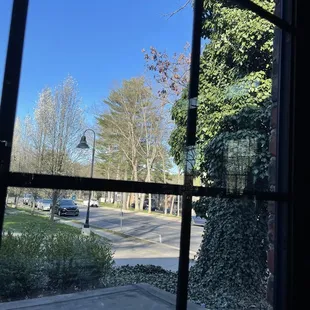 a view of a street through a window