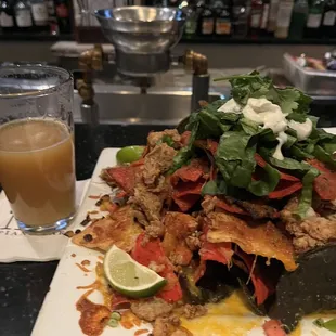 Oyster Nachos.  A lot, but I finished it by myself like a beast.