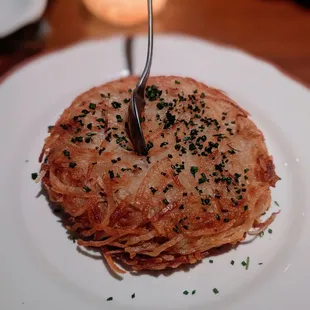 Stuffed hash brown melted onion.  They forgot to give us sour cream.