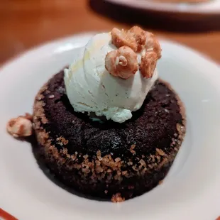 Molten chocolate cake. $14. Skimpy. Like a warm brownie for 1. I&apos;d skip next time.