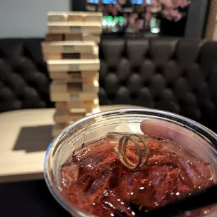 a person holding a drink