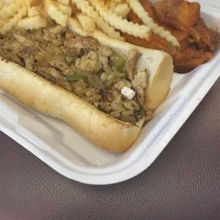 Chicken Philly Steak with CHEWED GUM, fries, and wings