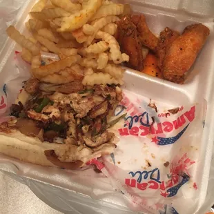 Half my chicken philly with wings &amp; fries...stingy with the cheese..