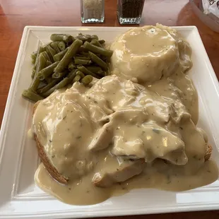 Hot Turkey sandwich and mashed potatoes with green beans. Was not too bad