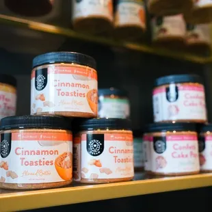 a shelf of coffee and cinnamon toasters
