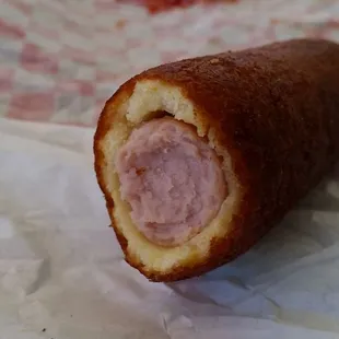 a sausage wrapped in bread