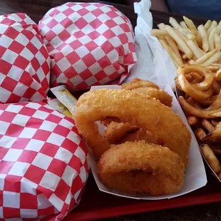 a tray of onion rings, onion rings, and onion rings