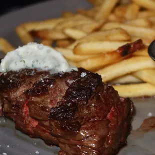 The Steak Frites were made with ribeye cap, bone marrow butter, arugula salad, &amp; fries.