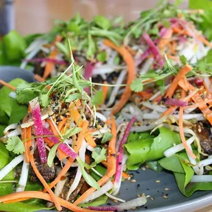 The Portobello Wraps were made with Bulgogi marinade, grilled portobello, bibb lettuce, carrot, sprouts, radish, cilantro, &amp; toasted garlic.