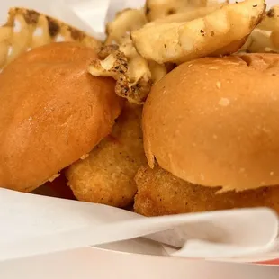 a hamburger and fries in a basket