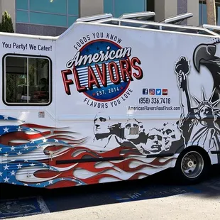 a food truck parked in front of a building